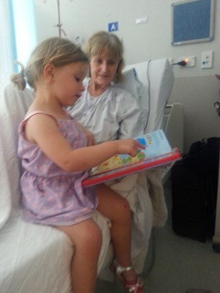 Reading to Grandma in hospital