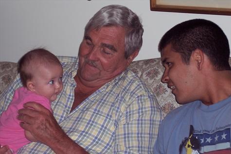 Isabelle with her Great-Grandaddy Poppi and her Daddy Jordan - July 15, 2007