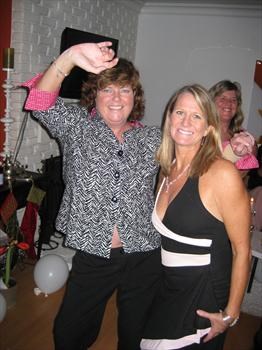 Nicole and Andrea dancing at Kara's, December 2008