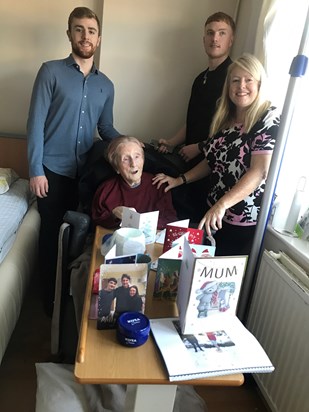 Christmas Day 2019. Mum enjoying her xmas cards and admiring the thoughtful photo xmas card of Charlie, Gearoid & Grace Patterson mum’s Great Nephews and Niece living in New York 