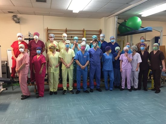 Physio team at Princess of Wales hospital, Bridgend, during the pandemic showing off our rainbow of scrubs (I'm on the right at the back in royal blue) 2020 
