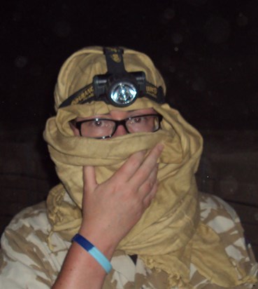 Covering up against a sandstorm - Afghanistan 2010