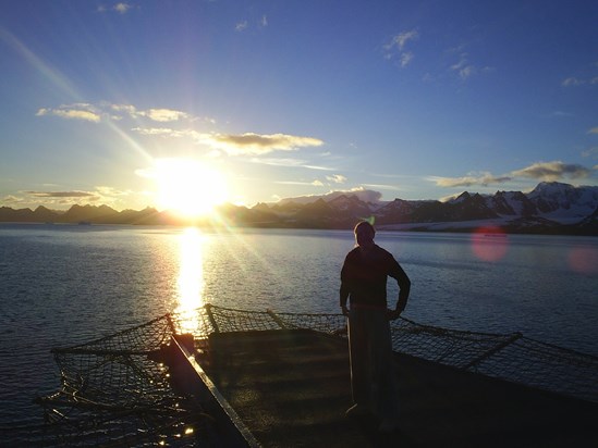 Enjoying a South Atlantic sunrise off the flight deck of the Gold Rover - 2004