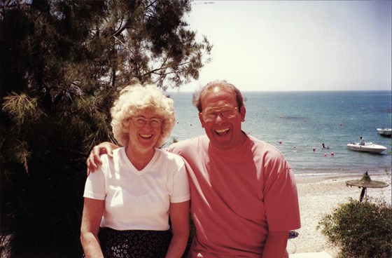 Mum and Dad on holiday laughing