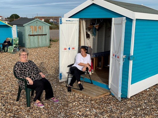 Mum and Maxine enjoying the beach hut at Hayling, 2018