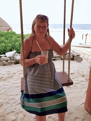 Sally loved the swing at Valentin Imperial Riviera Maya, Mexico