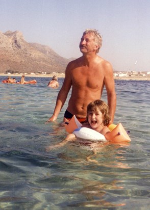 With his daughter Tali on the beach