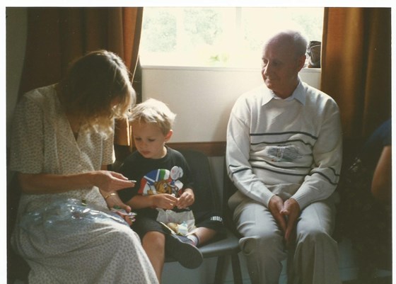 Alex with Mummy and Grandad John