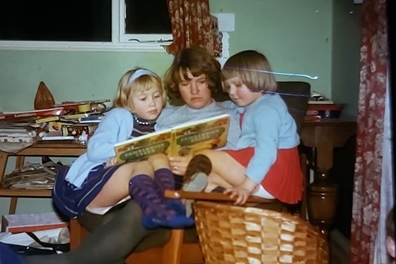 Reading a story to Lesley and Jenny