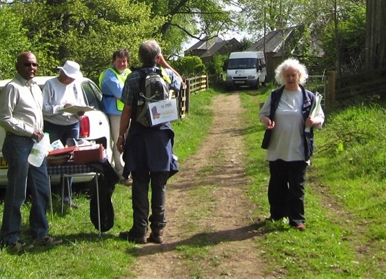Typical Lesley, huge folder in one hand, phone in the other and busy. Checkpoint on the St. Cuthbert's Way walk.