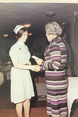 Margaret qualifying as a registered nurse. 