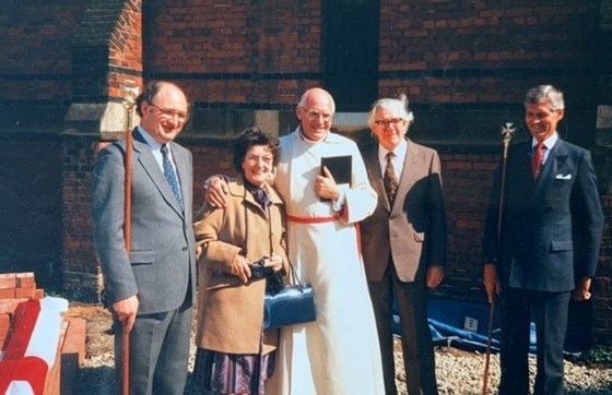 Tom Dot and Clergy outside the church hall