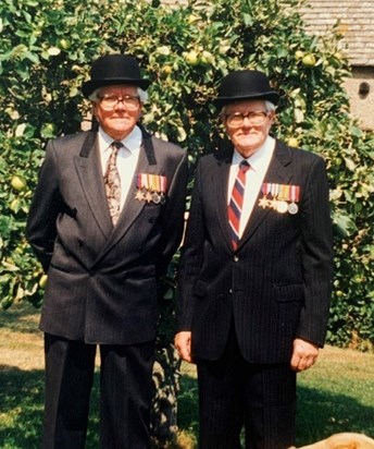 Tom and Dick with their medals 