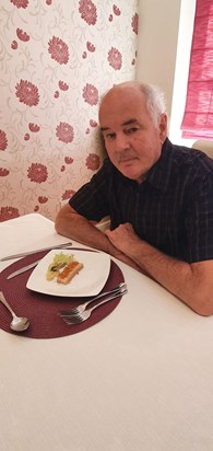 Dad doing what he loved - eating fine food (on his wedding anniversary this year)