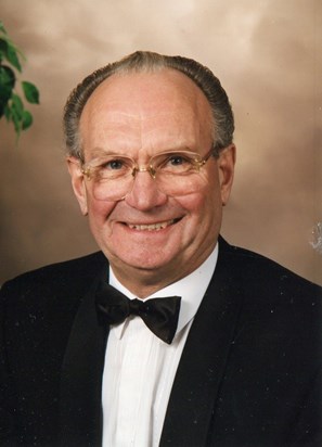 Mr M Swatton Front of OOS and holding photo.jpg