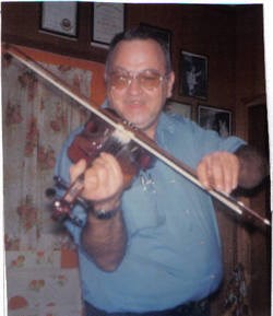 Daddy playing his fiddle