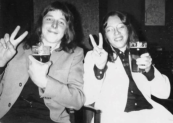 That's not John Lennon with Stuart.... it's Alan.