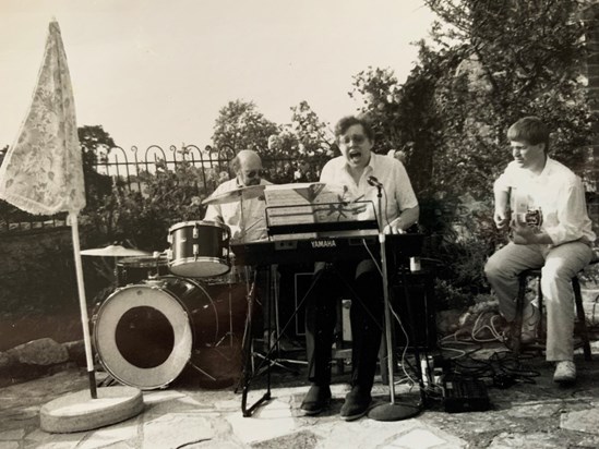 Rob doing what he loved - singing and playing the piano in one of the many bands he was in over the years 