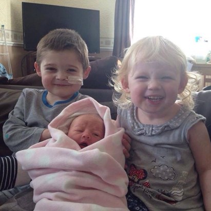 Corey, and his baby sisters Isabelle and Caitlyn