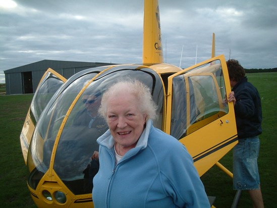 Mum about to get in the helicopter over the Twelve Apostles on the Great Ocean Road!
