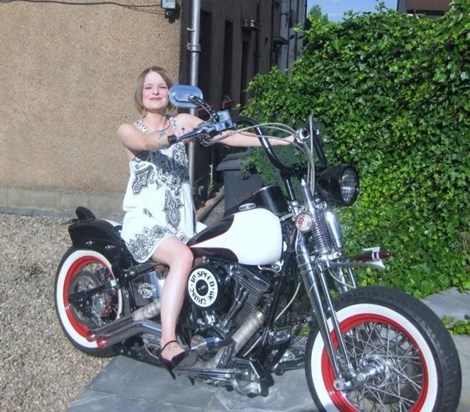 Stevie on her dads Harley