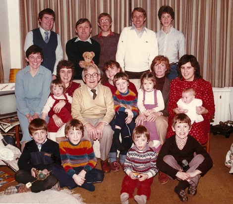 Bob (centre of back row) with his brothers, sister and families