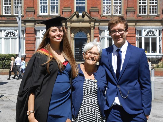 She did it!!!!!!!  Your Sweetheart and Best Pal celebrating with their lovely Gran.  Robyn had your picture attached to her gown so you could still be with her xx