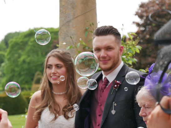 Mr and Mrs Crow with bubbles.  One of our Jason's amazing photos, he should be a photographer!