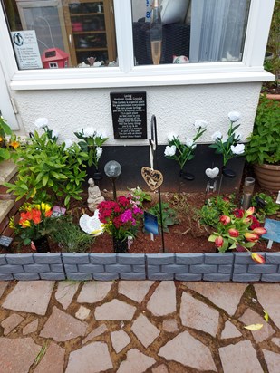 This is a piece of your garden dad just dedicated to you and your grand kids wanted some where they can leave flowers and reflect and there is no where better than your garden you enjoyed and worked hard on xxx