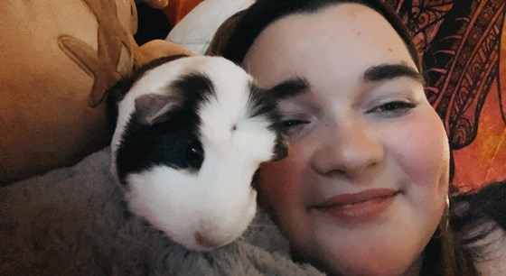 She loved her guinea pigs. She had 5 when she passed, but had a total of 7.