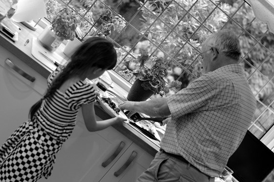 July 15 Grandad teaching Ruby how to cook