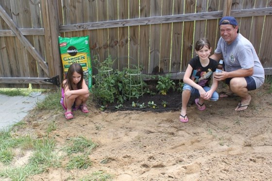 Dave and his granddaughters Michelle and Lilly started a vegetable garden