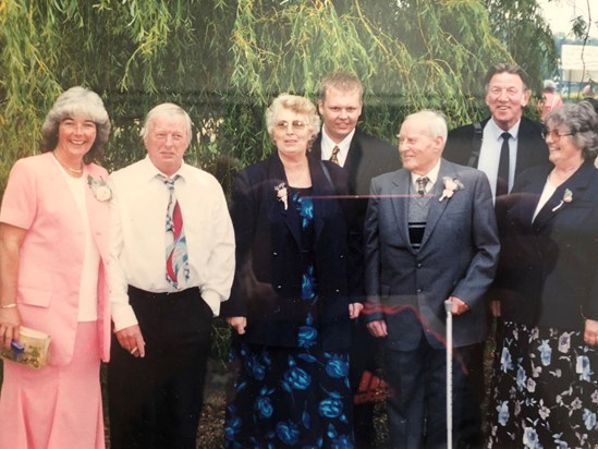 Gill and her siblings and her Mum and Dad at a family wedding