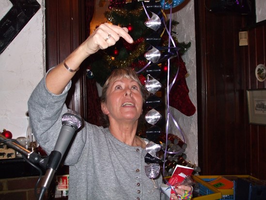 Anne setting up decorations for the New Years Eve party, 2007