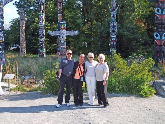 Anne Eddie and fellow travellers, Totem Poles, Stanley Park, Vancouver, Canada, September 2009.