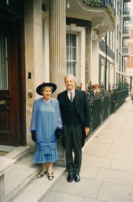 Dad and Mum outside the Army & Navy club just before going to receive his CMG from the Queen