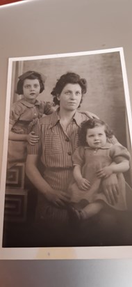 Mum with Granny and Brenda, age 7-8?