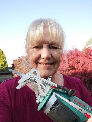 Janet very pleased  with her new garden gadget from Gaynor McGlynnMG 20200514 WA0005