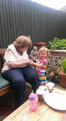 With great grandaughter in the garden