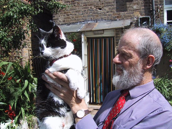 Peter and Warbles again (both photos 2001).  His ashes, in a red velvet-wrapped box,  were kept on a shelf that was part of Peter's bed head. His instruction is that his ashes and those of Warbs are to be mingled and scattered on our garden.