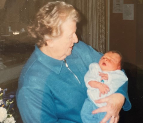 A cuddle with first Great Grandson 2000