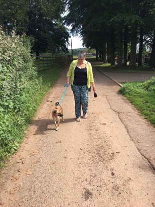 Mum taking Skye for a walk up the lane