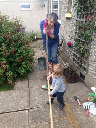 Mum enjoying helping little Kane doing the Gardening