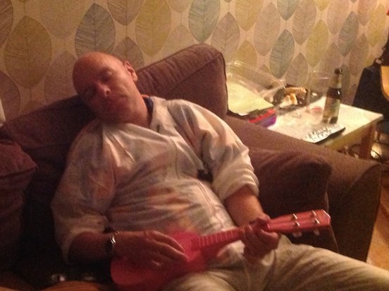 Paul a bit tired after Jonny’s 40th after party playing the ukulele 😀