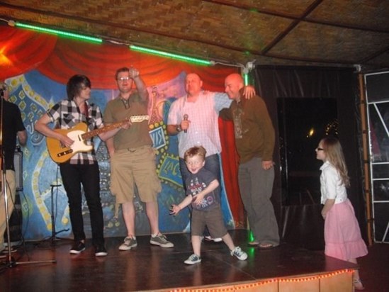 Me, Craig, Thomas, Martin, Paul & Matilda doing Karaoke in Cyprus. Not sure where the guitar came from...