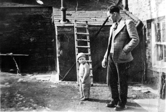 Ivor as a toddler in 1944 with his father John Harries