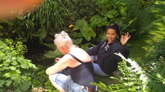 Leah and jen looking at pond