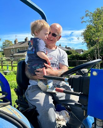 Tractor rides with his grandson Cameron
