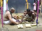 oldest son repeating prayers after the brahman