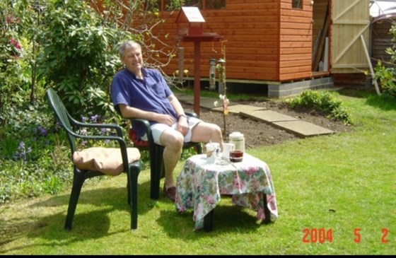 Relaxing in the garden,  with his new shed,  2004